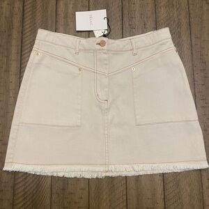 DELUC Raw hem ivory stretch denim skirt M NWT